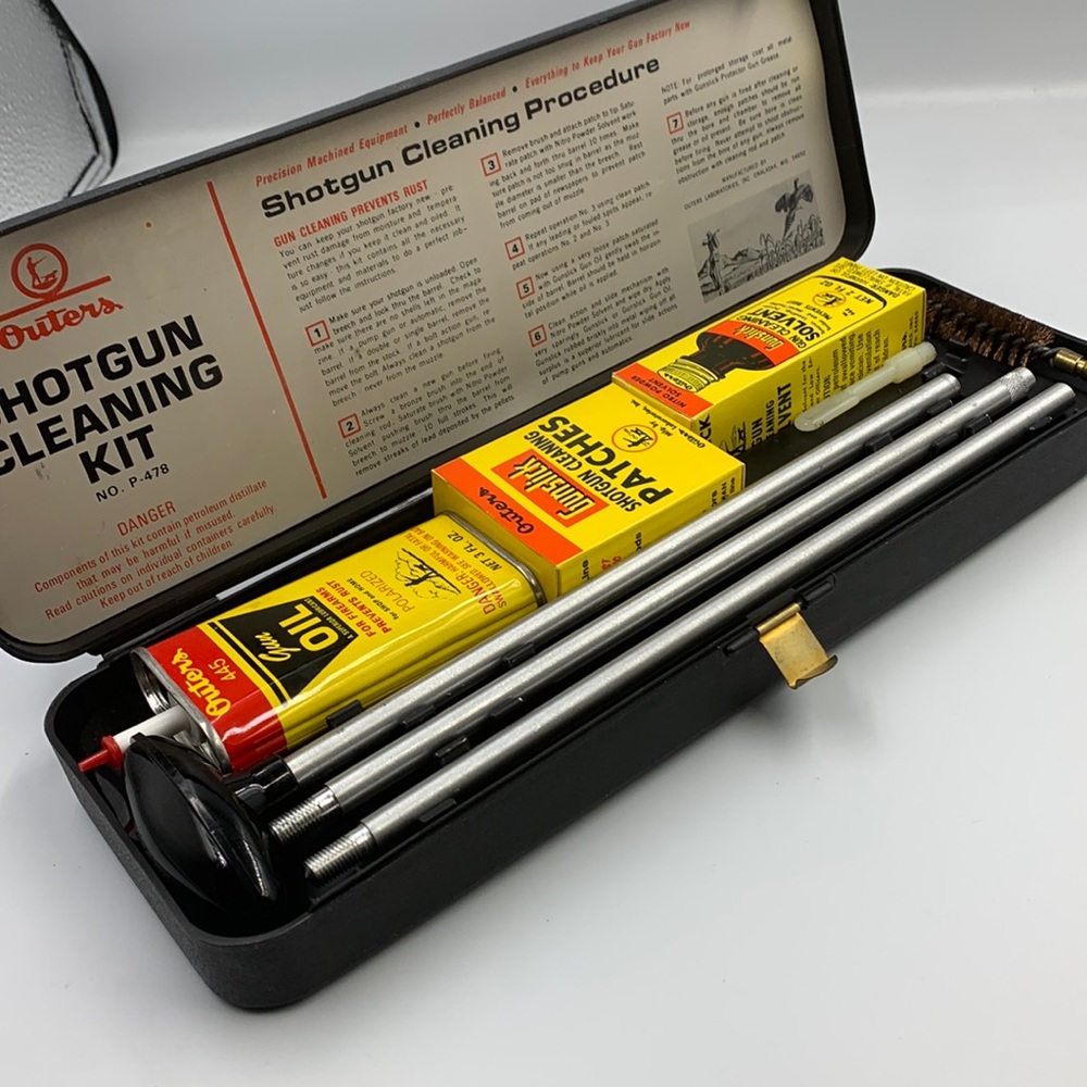 Vintage shotgun cleaning kit.